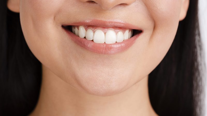 woman-s-smile-with-clear-skin